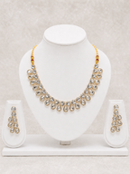 Elegant Gold-Plated White Kundan Necklace Set with Matching Drop Earrings & Maang Tikka