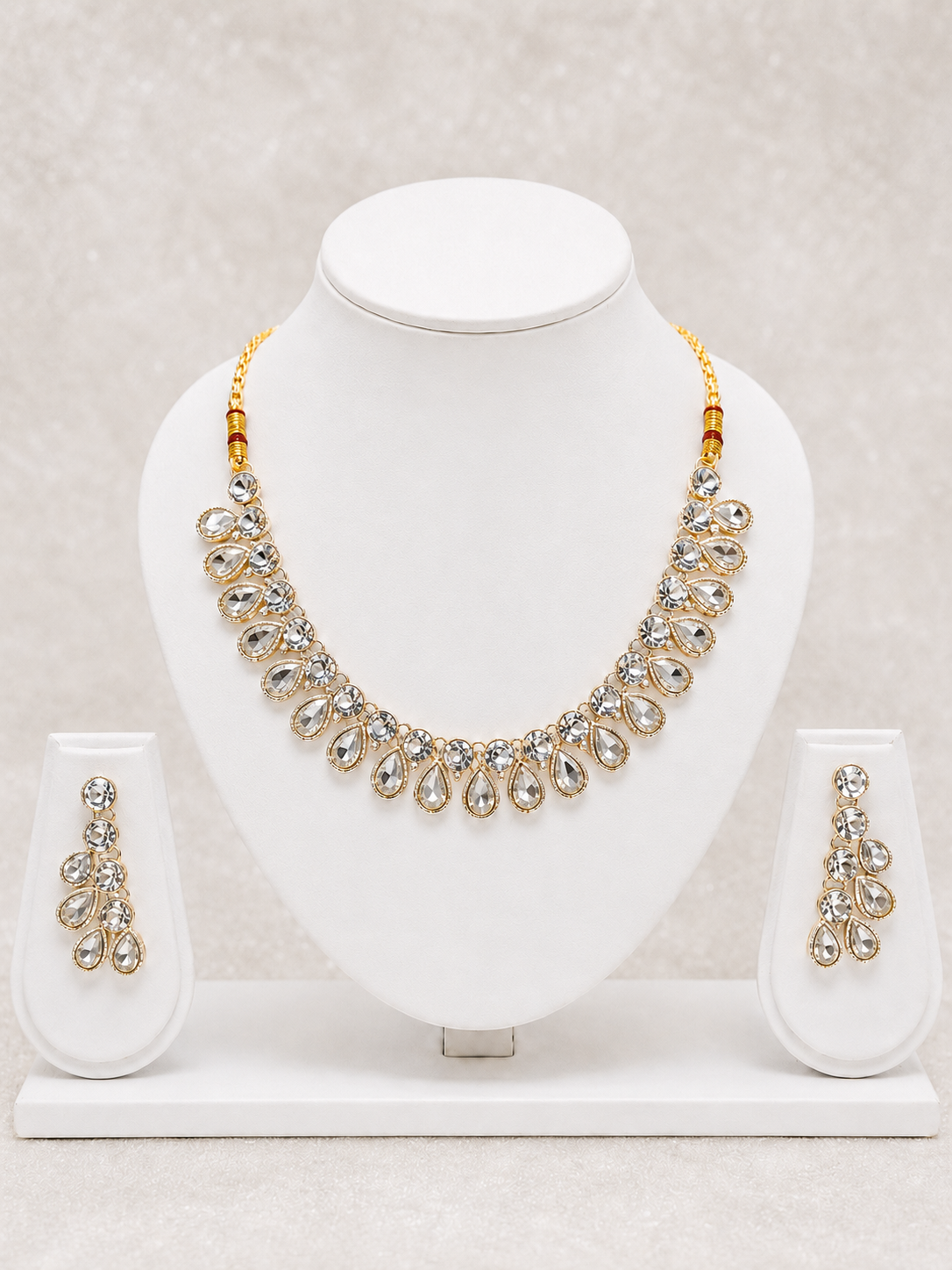 Elegant Gold-Plated White Kundan Necklace Set with Matching Drop Earrings & Maang Tikka